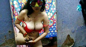 Indian model Savita is fucking her twat with fake penis