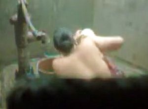 Thick cool gal indian bhabhi taking douche from pump