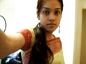 Cute Desi nubile undresses on web cam