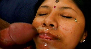 Indian damsel Botsy is plumbed in a mmf 3some intercourse